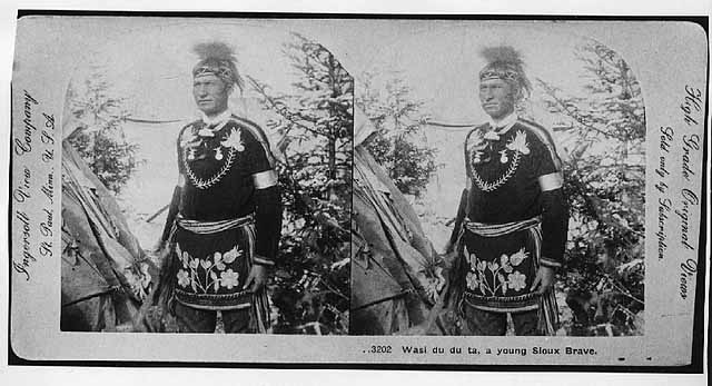 Wasiduduta in traditional Woodland clothing